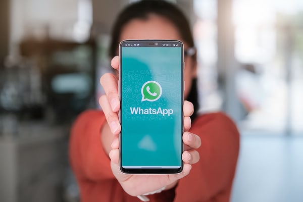 WhatsApp displayed on a phone.
