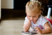 Young child using a phone